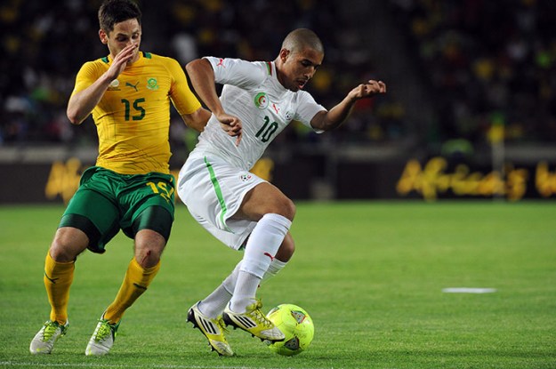 Algeria's Sofiane Feghouli and South Africa's Dean Furman