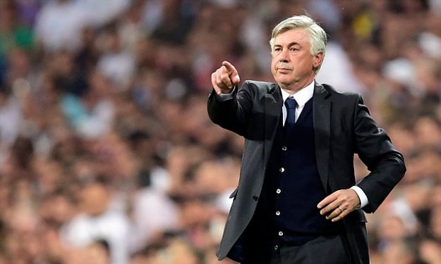 (FILES) This file photo taken on May 13, 2015 shows then Real Madrid's Italian coach Carlo Ancelotti gesturing during the UEFA Champions League semi-final second leg football match Real Madrid FC vs Juventus at the Santiago Bernabeu stadium in Madrid. As Spanish sports newspaper Marca and Spanish broadcast Cadena Cope reported on December 17, 2015, Italian former head coach of Real Madrid Carlo Ancelotti will follow Pep Guardiola as head coach of German bundesliga football club FC Bayern Munich. / AFP / GERARD JULIENGERARD JULIEN/AFP/Getty Images